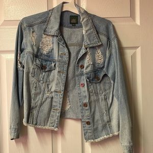 Jean jacket with rips